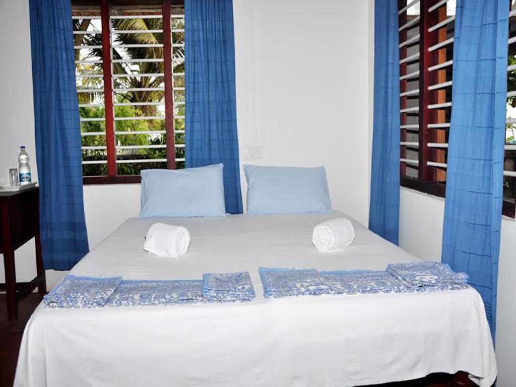 Angeo Beach House Alappuzha Szoba fotó